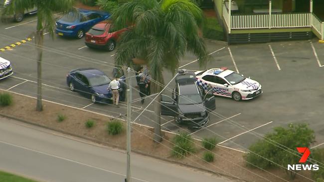 Queensland Ambulance paramedics have taken a Gold Coast police officer to hospital after he was hit by a stolen car at the Gem Hotel in Alberton. Picture: 7 News