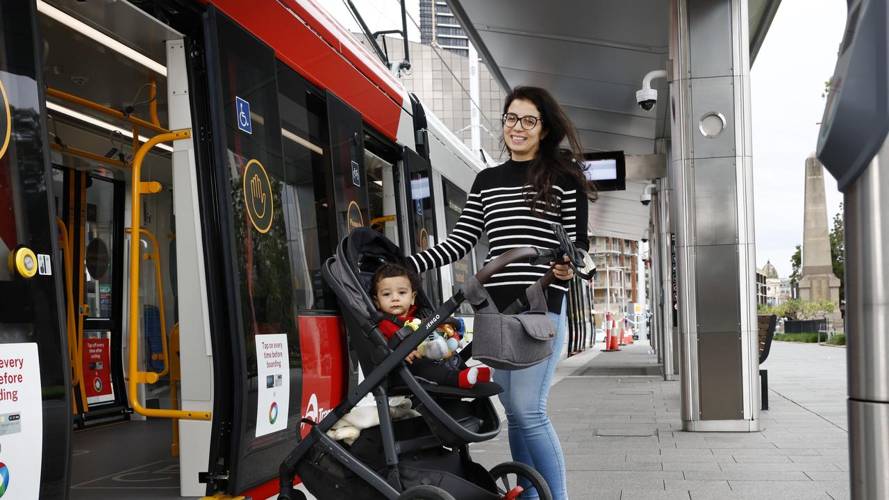 Heba Kassoua with her baby boy Gaber, said getting to sporting matches at Accor Stadium would be a highlight of the new rail for her. Picture: Richard Dobson