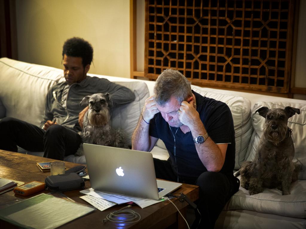 Loyal mates ... watching Jimmy work in the studio. Picture: Robert Hambling