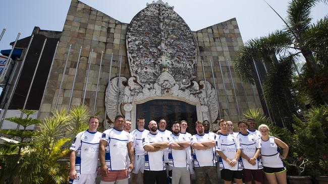 Members of the Palmyra Rugby Union Club, from Western Australia, gather at the Bali bombing memorial yesterday.