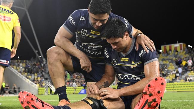 Jordan McLean and Jason Taumalolo realise their race is run.