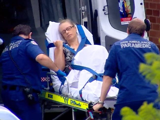 Science teacher Carolyn Cox is taken to hospital after being stabbed. Picture: John Tesoriero/Oceania Productions