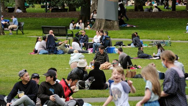 People having a picnic in the Carlton Gardens in Melbourne. Picture: NCA NewsWire / Luis Enrique Ascui