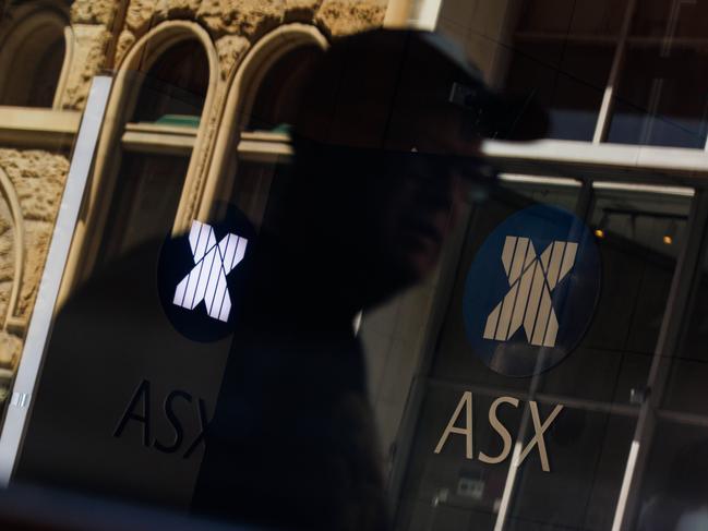 SYDNEY, AUSTRALIA - NewsWire Photos, October 29 2024. GENERIC. Stocks. Finance. Economy. People walk past the Australian Stock Exchange, ASX, on Bridge Street. Picture: NewsWire / Max Mason-Hubers