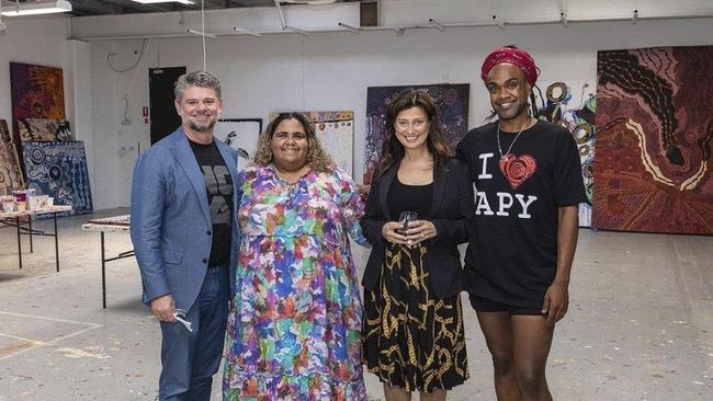 SA Arts Minister Andrea Michaels with NGA director Nick Mitzevich, APYACC board member Sally Scales and Wynne Prize winner Zaacariah Fielding at the centre's Adelaide studio.