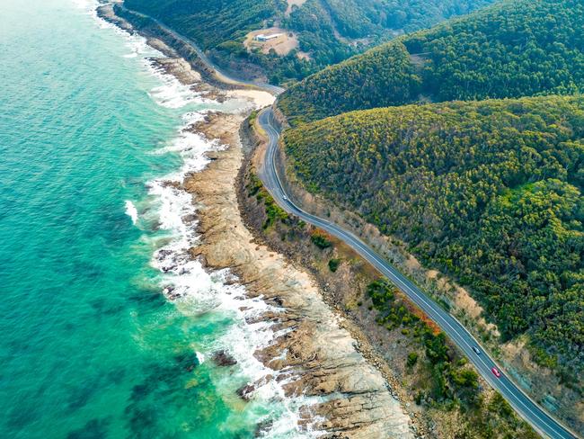 Cars driving on Great Ocean Road, Victoria, Australia  - aerial view