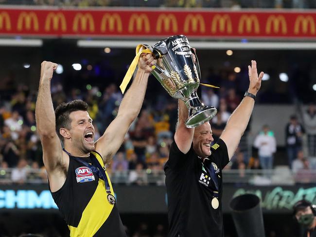Captain Trent Cotchin and Richmond coach Damien Hardwick on the podium after the win 2020 AFL Grand Final match between the. Richmond Tigers and the Geelong Cats at the Gabba on October 24, 2020 in Brisbane, Australia. Picture: Sarah Reed