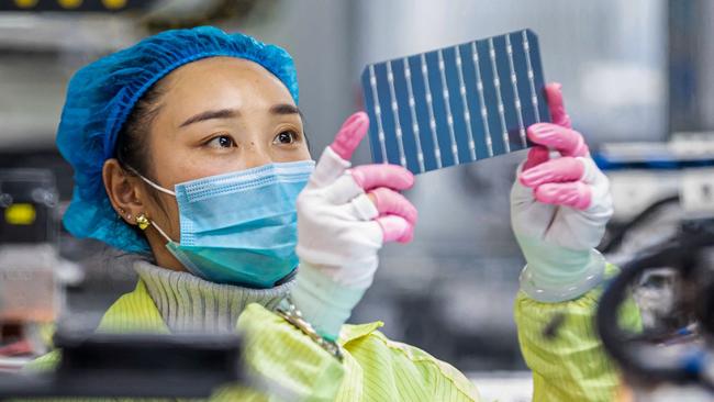 The green transition is creating thousands of jobs but unfortunately they are in China, like this worker at a factory in Haian. Picture: AFP