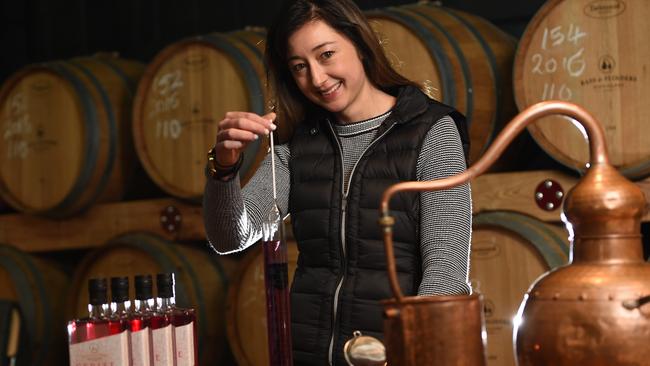 Holly Klintworth puts the finishing touches on Bass and Flinders Cerise Gin. Picture: Chris Eastman