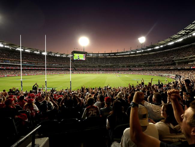 Collingwood fans celebrate a goal with a big crowd during the Round 1 AFL match between the Collingwood Magpies and the Sydney Swans at the MCG on March 15, 2024. Photo by Phil Hillyard(Image Supplied for Editorial Use only - Phil Hillyard  **NO ON SALES** - Â©Phil Hillyard )