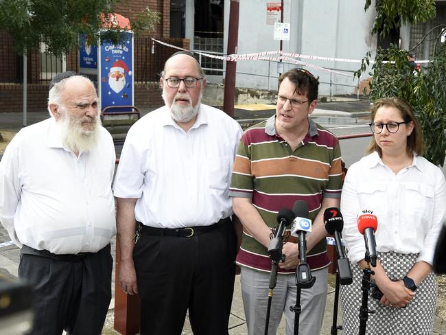 Benjamin Klein, Yossi Aron, Daniel Aghion KC and Naomi Levin speak to the media after the fire tore through the synagogue. Picture: Andrew Henshaw