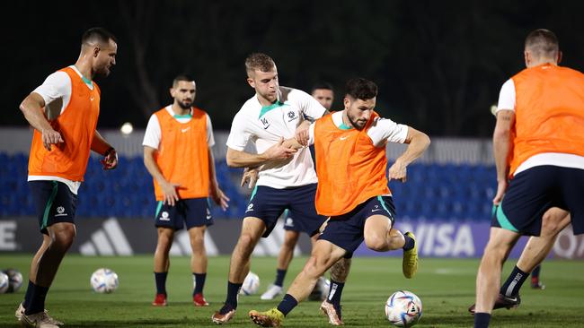 Mathew Leckie and Riley McGree during Socceroos training ahead of the match against Argentina. Picture: Robert Cianflone/Getty Images