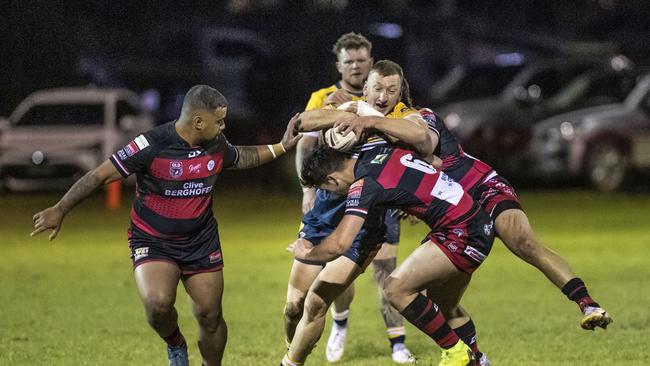 Brock Diment for Valleys tackles Carl Clement for Highfields. Valleys vs Highfields. TRL Hutchinson Builders A Grade. Saturday, June 11, 2022. Picture: Nev Madsen.