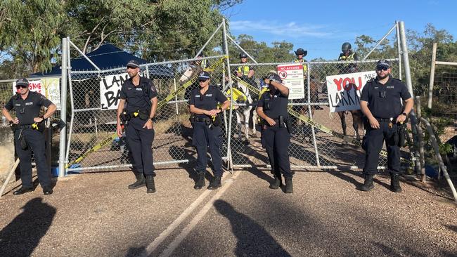 Around 20 Save Lee Point protesters clashed with construction workers and police as bulldozers moved in to the controversial Defence Housing Australia development site on Tuesday morning. Picture: Zizi Averill