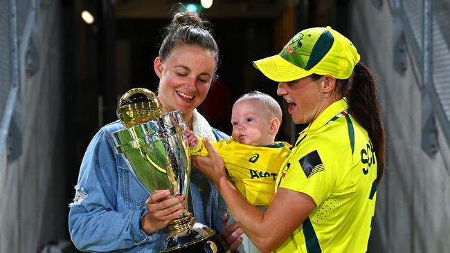 CHRISTCHURCH, NEW ZEALAND – APRIL 03: Megan Schutt (right) celebrates the 2022 ICC Women’s World Cup win with wife Jesse and daughter Rylee. Picture: Hannah Peters/Getty Images