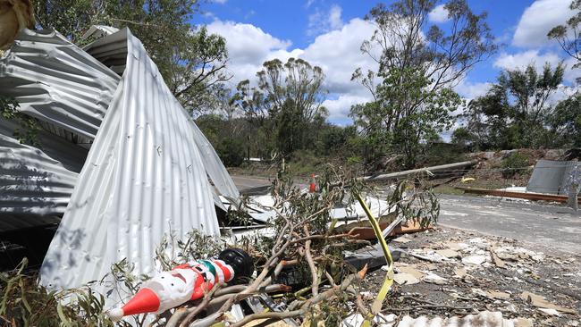 Roofing causes major hazards across multiple roads at Eagle Heights, Mt Tambourine after a massive storm swept through Christmas Night destroying houses and Electricity supplies. Photo: Scott Powick Newswire