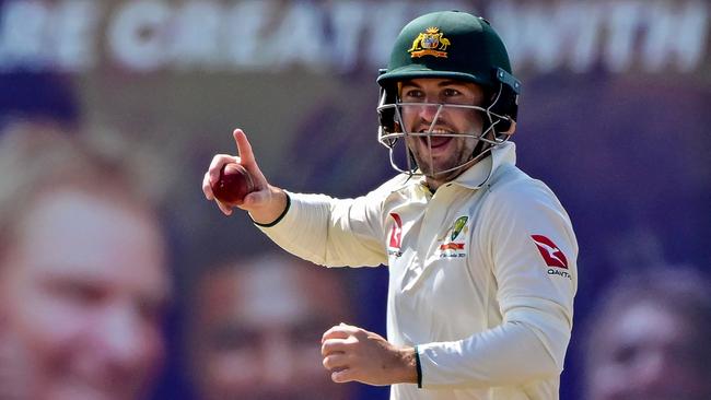 Australia's Josh Inglis takes a catch to dismiss Sri Lanka's Nishan Peiris during the fourth day of the first Test cricket match between Sri Lanka and Australia at the Galle International Cricket Stadium in Galle on February 1, 2025. (Photo by Ishara S. KODIKARA / AFP)