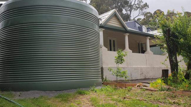 Branko Soda arrived home to find a rainwater tank almost touching his home.