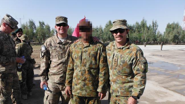 US Army Major Robert Peters, Afghani interpreter ‘Hassan’, and Australian Army Captain (ret) Jason Scanes, in Kandahar in 2013.