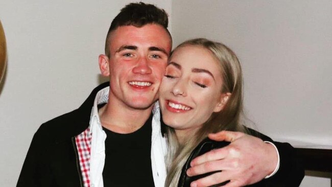 A tradie stabbed to death during a wild party in a CBD high-rise has been identified as Liam Cahill (left), pictured with friend Macayla Dickson.