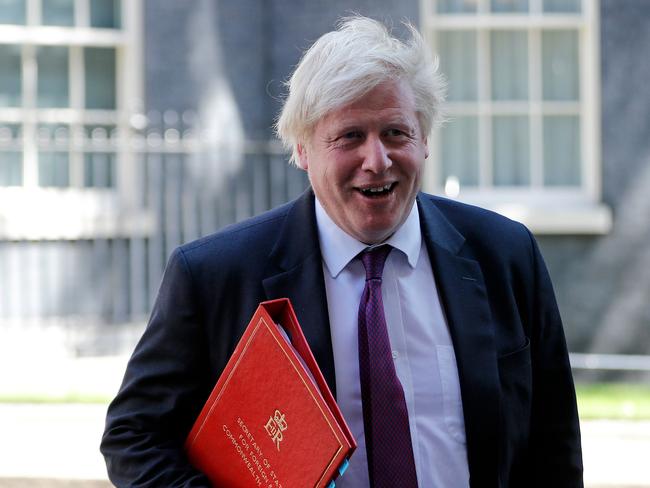 (FILES) In this file photo taken on June 26, 2018 Britain's Foreign Secretary Boris Johnson leaves 10 Downing Street in central London after attending the weekly cabinet meeting on June 26, 2018. - Almost in the same breath, Boris Johnson supporters hail his optimistic vision for Britain, while reassuring the listener that he will have a team to take care of the details. The ex-London mayor has wooed Tories with a promise to get Britain out of the European Union and if elected party leader, he will take over as prime minister on July 24. But critics are alarmed at how Johnson seems to struggle with the finer points of Brexit, and question his attention to detail in previous jobs. (Photo by Tolga AKMEN / AFP)