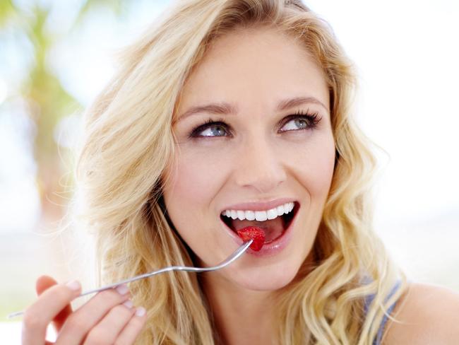 For BW Magazine 20/1 - Stock Photos: Pretty young woman enjoying her fruit salad