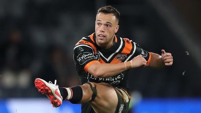 Tigers Luke Brooks kicks the winning field goal during the Wests Tigers v Bulldogs NRL match at Bankwest Stadium, Parramatta. Picture: Brett Costello