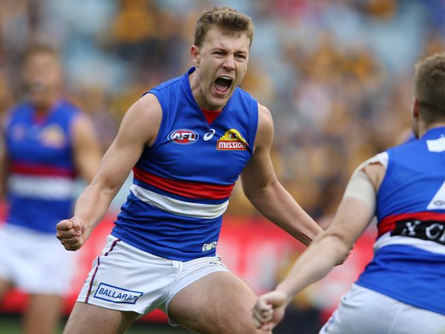 AFL. Round 3. 31/03/2019.  Hawthorn vs Western Bulldogs at the MCG.   Bulldog Jack Macrae  celebrates after gosling late in the last qtr   . Pic: Michael Klein.