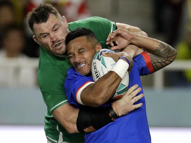 Ireland's Cian Healy tackles Samoa's Dwayne Polataivao. Picture: AP