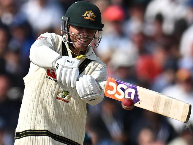 David Warner plays a shot during the fourth Ashes Test at Old Trafford. It has been another relatively lean series in England for the veteran opening batsman, who is nearing international retirement. Picture: Oli Scarff/AFP