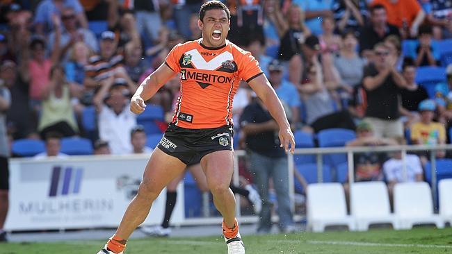 David Nofoaluma scores during the Gold Coast Titans v Wests Tigers NRL Round 2 game at Cb