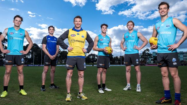 Kangaroos youngsters (from left) Mitchell Hibberd, Taylor Garner, Declan Mountford, Daniel Nielson and Jy Simpkin with Brent Harvey. Picture: Jake Nowakowski