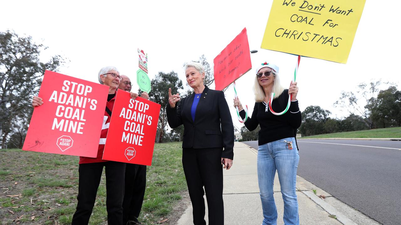 Dr Phelps with some additional protesters. Picture: Gary Ramage