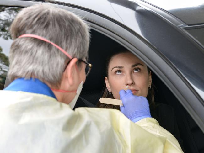 A nurse from SA Pathology tests a patient at the new drive through clinic at Hampstead Rehabilitation Clinic. Picture: AAP