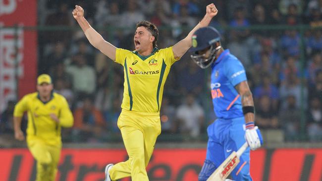 Australian bowler Marcus Stoinis celebrates the wicket of Indian captain Virat Kohli during the fifth one-day international in New Delhi last month. Picture: Sajjad HUSSAIN / AFP