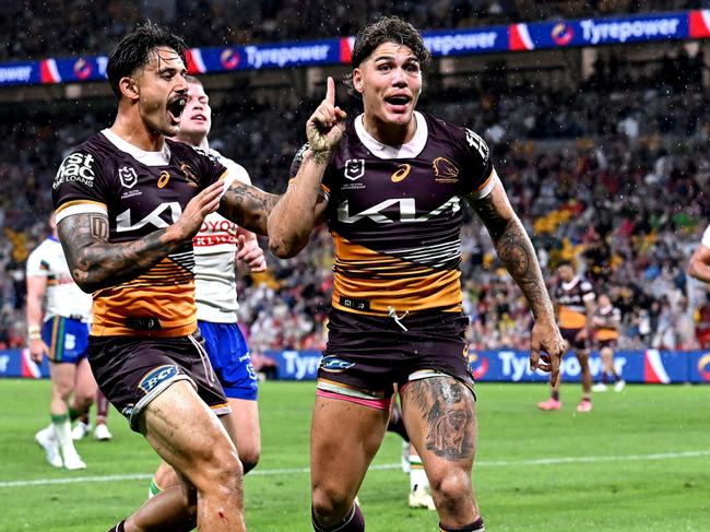 BRISBANE, AUSTRALIA - APRIL 20: Reece Walsh of the Broncos celebrates after scoring a try during the round seven NRL match between the Brisbane Broncos and Canberra Raiders at Suncorp Stadium, on April 20, 2024, in Brisbane, Australia. (Photo by Bradley Kanaris/Getty Images)