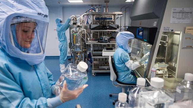 Employees test procedures for the manufacture of the messenger RNA (mRNA) for the Covid-19 vaccine at BioNTech’s new site in Marburg, central Germany. Picture: AFP