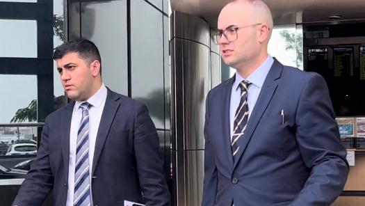 Whitefox Recruitment's Luke Hemmings (right) leaving court with his lawyer. Picture: Jessica Paul.