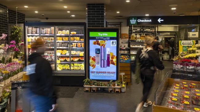 A retail media display at a Woolworths Metro supermarket.