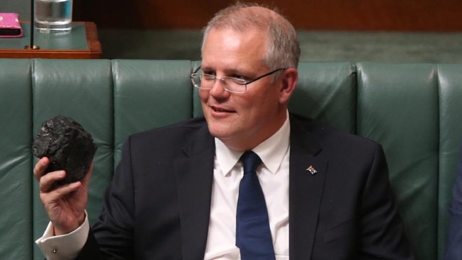 Scott Morrison with a lump of coal in parliament