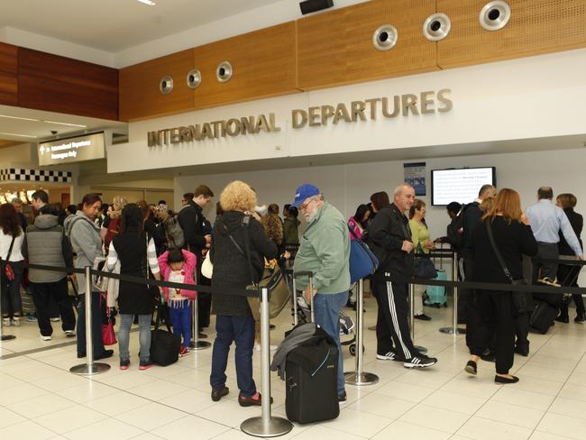 The Community and Public Sector Union has warned of significant disruptions and delays at international airports with a new round of industrial action scheduled for today. [PIC] passengers queue for their international flight, at Adelaide Airport pic by Bianca De Marchi - 3.8.15