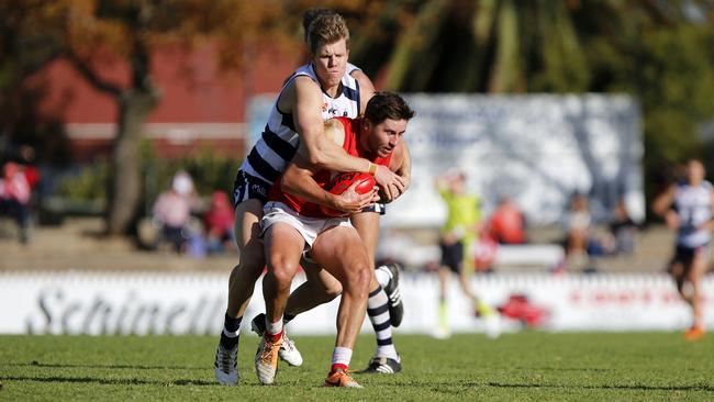 South Adelaide’s Tom Fields tackles North Adelaide’s Matt McDonough during the Panthers’ victory at Prospect Oval. Picture: Deb Curtis