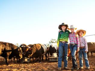 Quilpie Show. (L-R) Clay Egan, his sister Gabby Egan and the neighbour Lachlan Heinemann who helps with feeding the mini bulls each night.