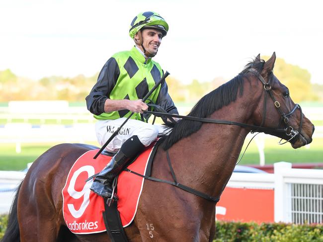 Jockey Billy Egan returns to scale after riding Strategic Phil to victory in the Ladbrokes Odds Boost Handicap. Picture: AAP/Pat Scala, Racing Photos