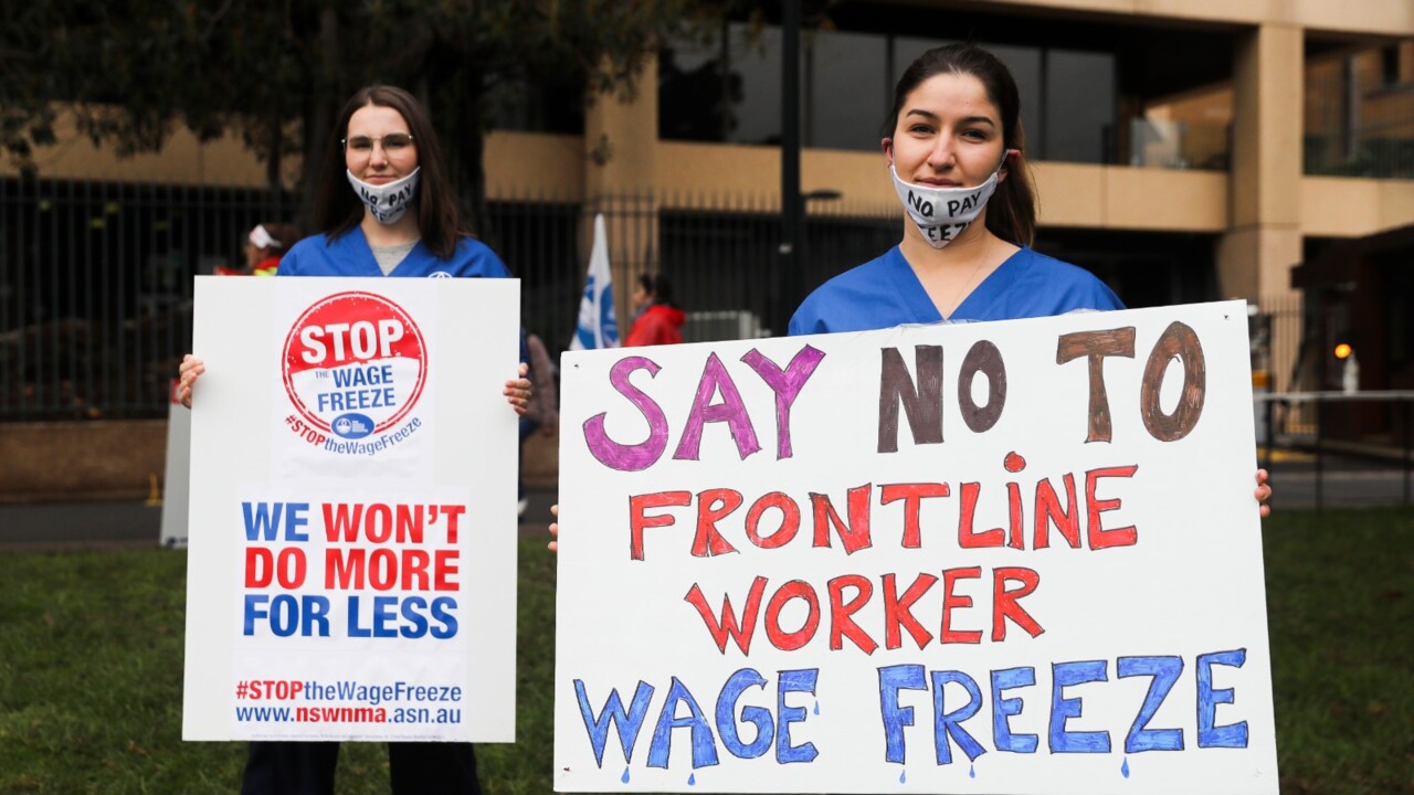 'Thank you doesn't pay the bills': NSW health workers strike for wage increase