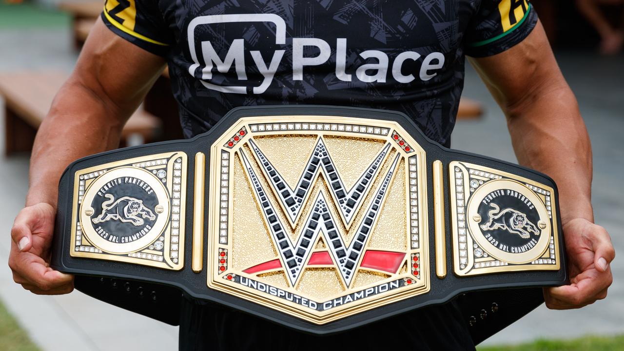 The Panthers have been recognised as the undisputed champions of the NRL by a couple of WWE superstars who presented players with a special championship belt. Picture: Max Mason-Hubers