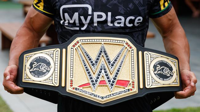 The Panthers have been recognised as the undisputed champions of the NRL by a couple of WWE superstars who presented players with a special championship belt. Picture: Max Mason-Hubers