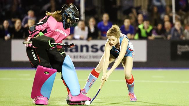 Action from the 2017 Cairns Hockey A-grade women's grand final between Souths and Saints. (L-R) Souths goal keeper Layla Parker stops a goal in the penalty shootout. Picture: BRENDAN RADKE