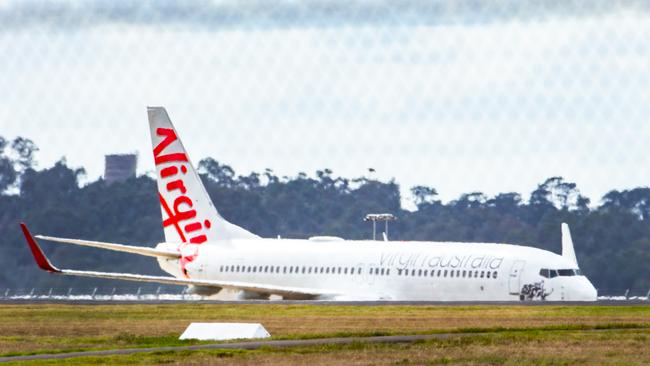 A Virgin flight sits on the tarmac at Melbourne Airport. NCA NewsWire / Sarah Matray