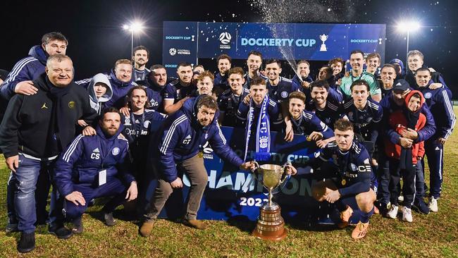 Oakleigh Cannons lift the Dockerty Cup. Picture: Mark Avellino